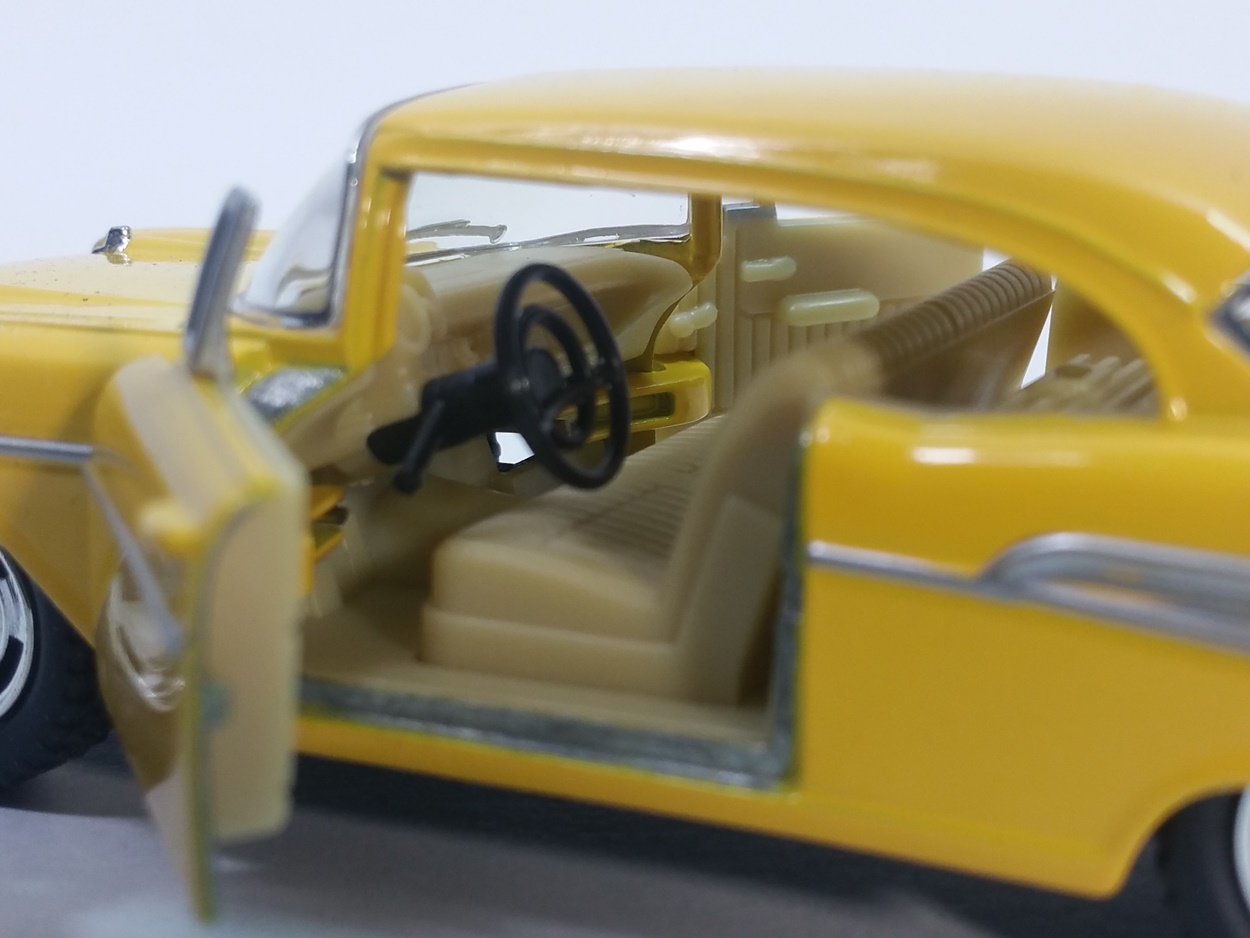 KiNSMART Bel Air's rubber tires and chrome accents enhance realism on display.