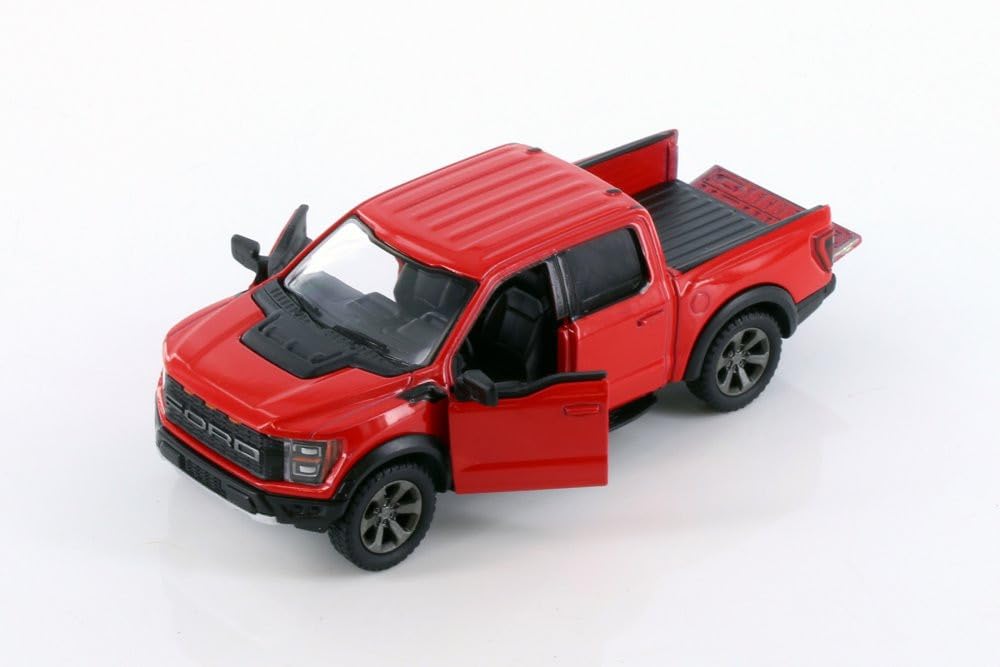 KiNSMART Ford F-150 Raptor 5-inch white die-cast model with pullback action.