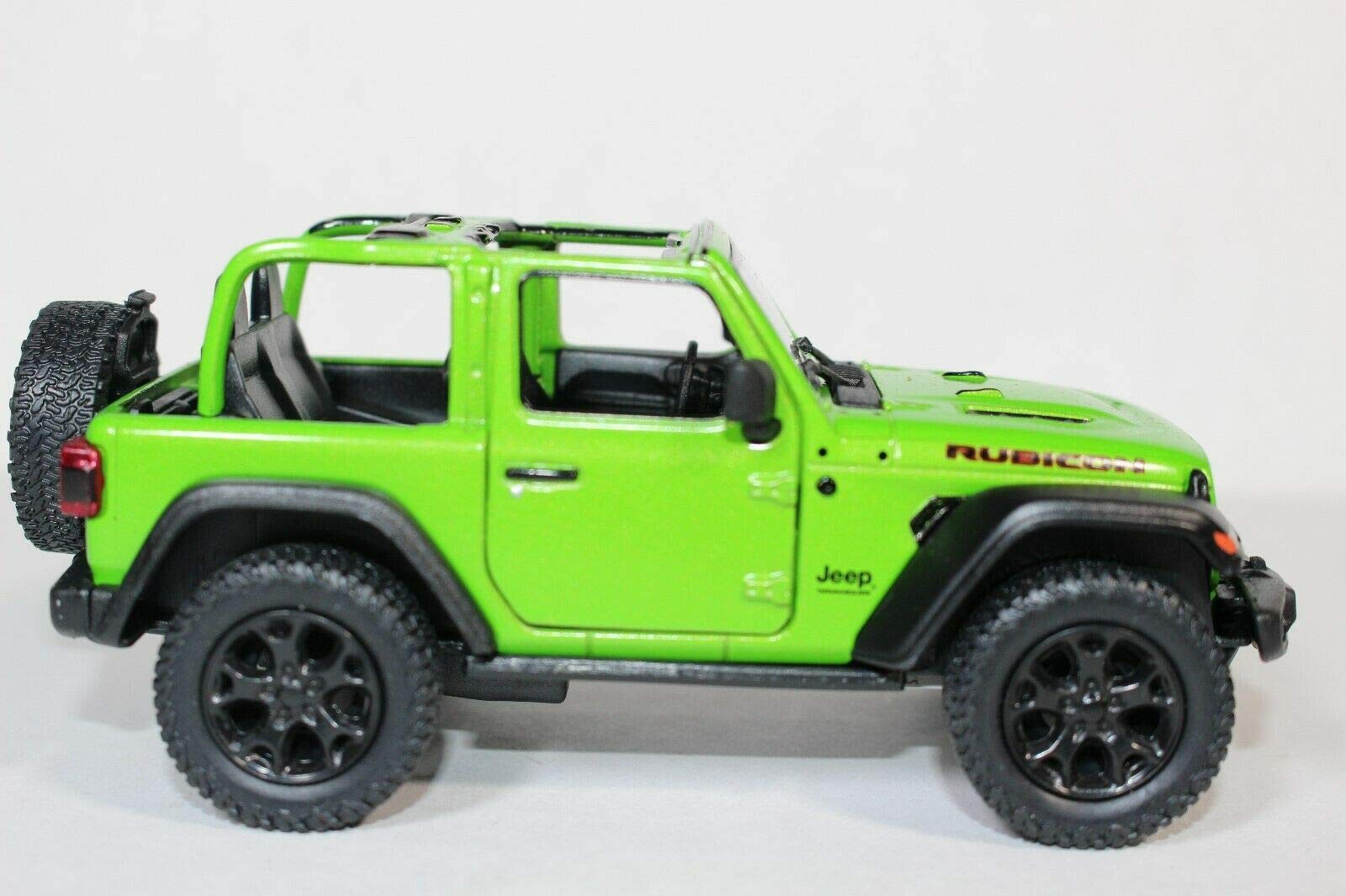 KiNSMART Jeep Wrangler Rubicon die cast construction offers lasting durability