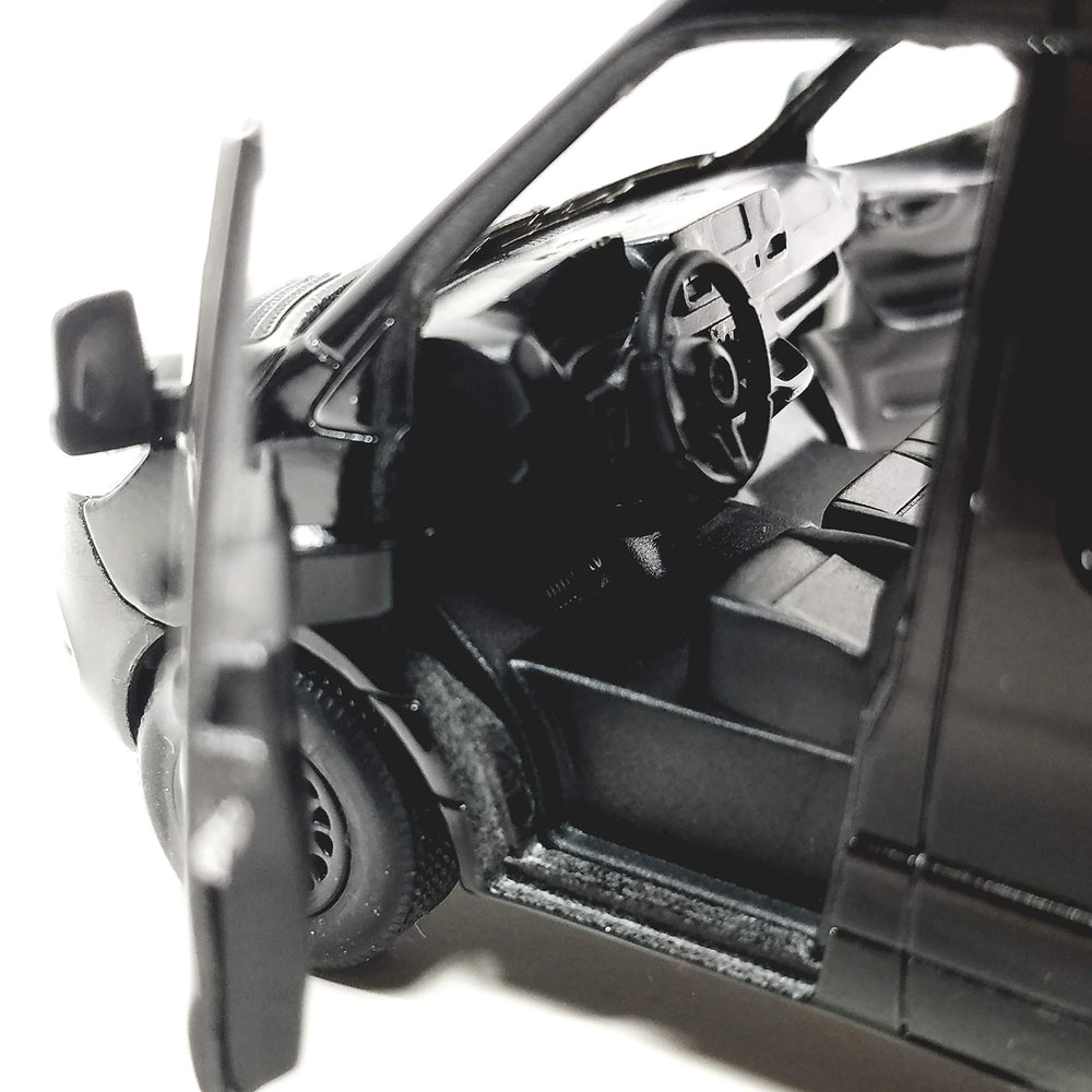 KiNSMART Sprinter rubber tires enhance authentic proportions and handling on display.