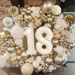 KISPATTI 18th-number balloon highlights the milestone with a bold numeral.
