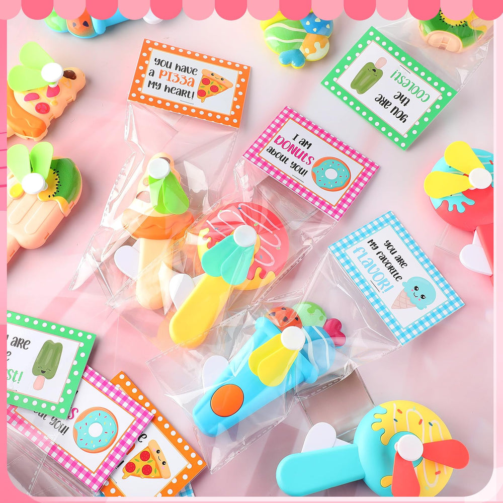 Kittmip mini handheld fans in multicolor for portable cooling.