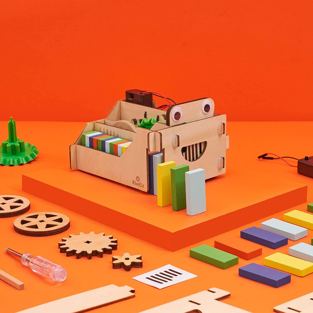 KiwiCo Domino Machine blueprint and tools guide kids through assembly steps.