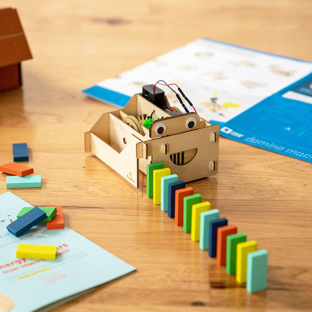 KiwiCo Domino Machine 100 wood dominoes set up for creative play sessions.