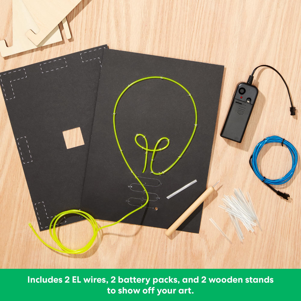 KiwiCo Light-Up Wire Art Kit battery packs power two neon signs for portable use.