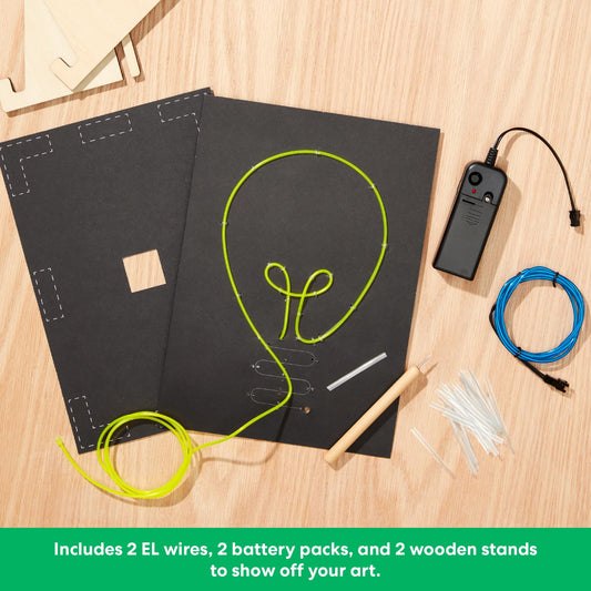 KiwiCo Light-Up Wire Art Kit battery packs power two neon signs for portable use.