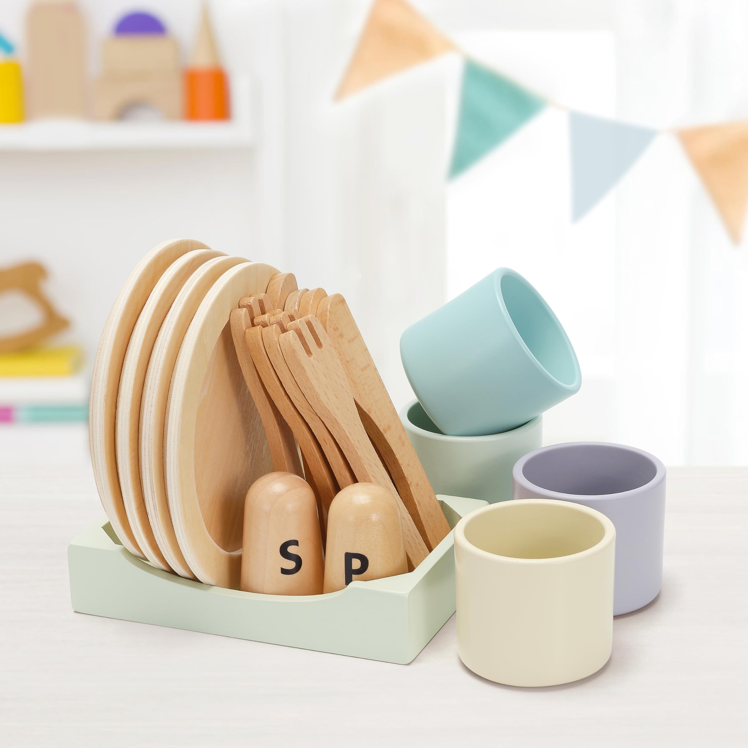 KizKnows plate rack keeps the play kitchen organized.