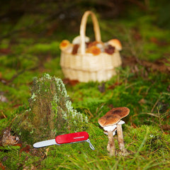 Klein Victorinox pocket knife toy includes plastic utensils for imaginative tasks.