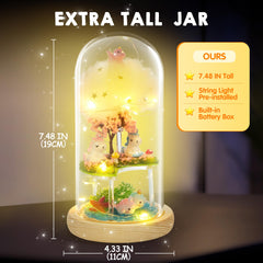 Klever Kits three-layer terrarium design with sky, land and ocean scenes for imaginative play.