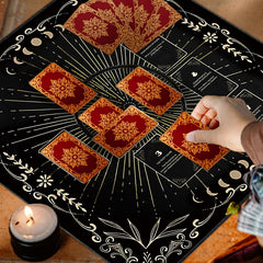 Knana black cloth frames cards and enhances visual focus during divination.