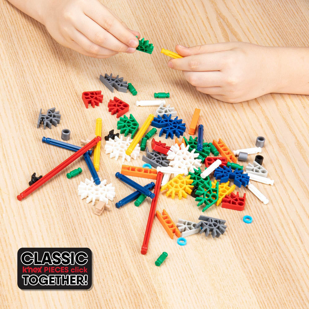 Instruction booklet included with K'NEX 100 Model Building Set guides 100 model ideas