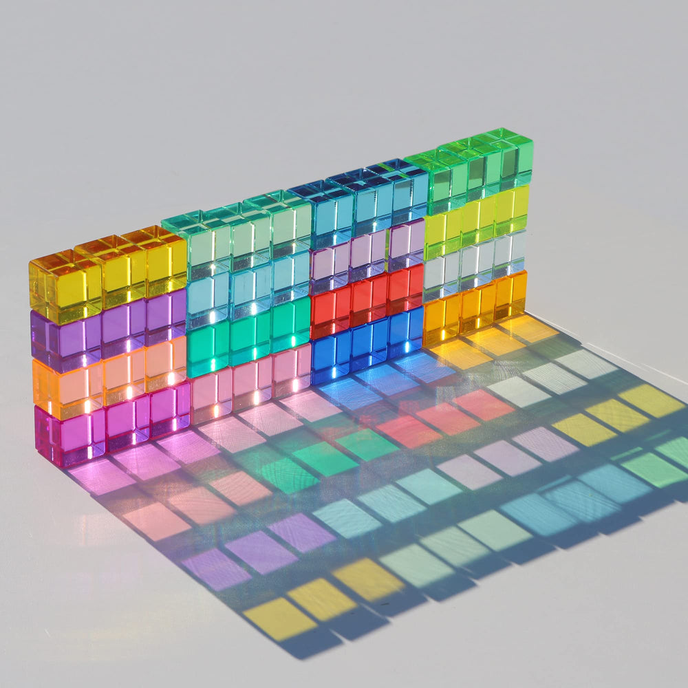 KOAICS Rainbow Crystal Cubes glow with light to create mesmerizing color shadows.