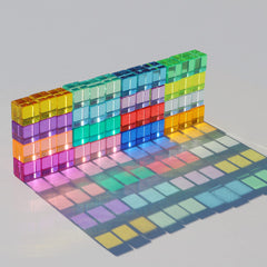 KOAICS Rainbow Crystal Cubes glow with light to create mesmerizing color shadows.