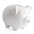 KOHIENWO piggy bank on a nursery shelf saves first coins.