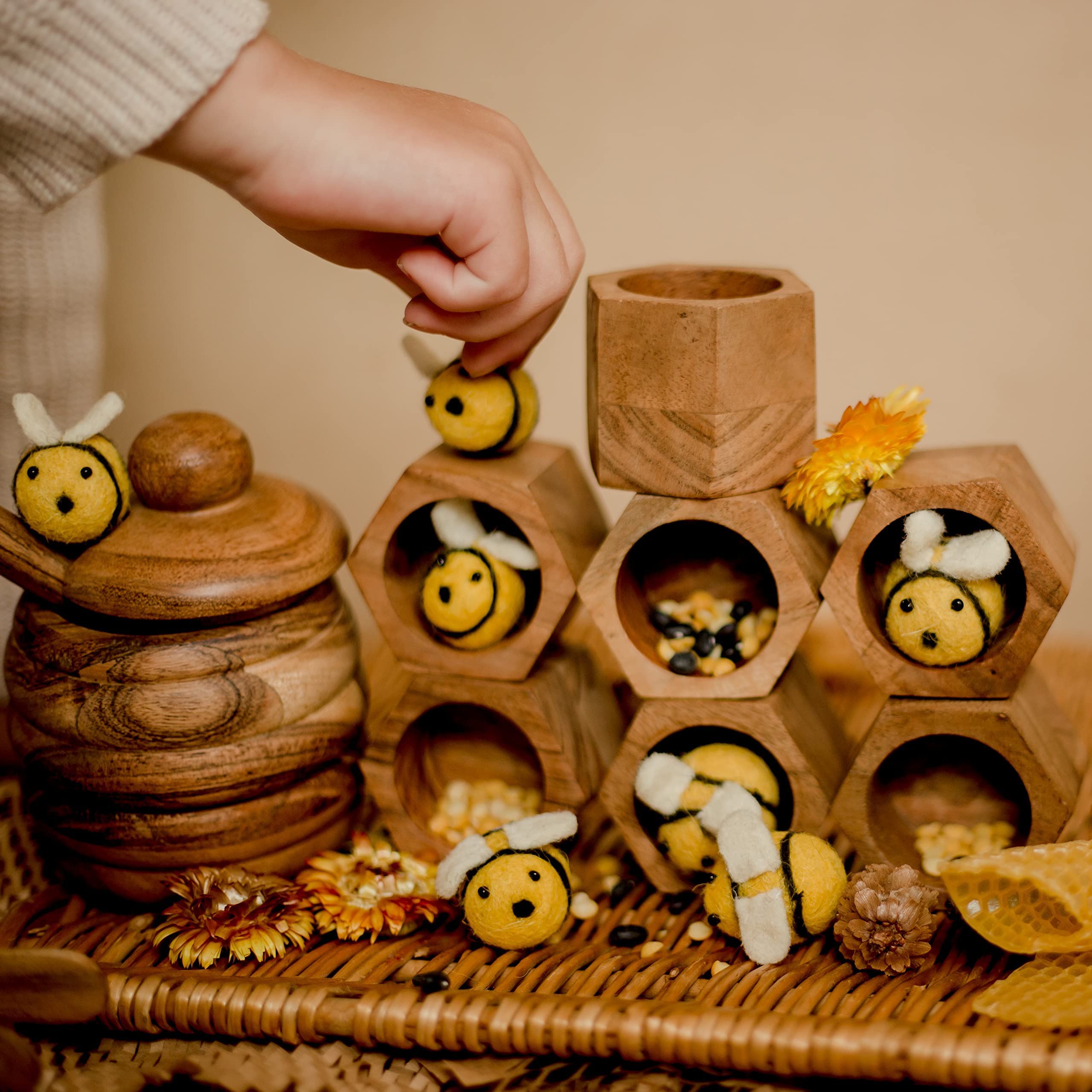 KOOKAROO wooden hexagons provide shape sorting and combinatorial play with the hive.