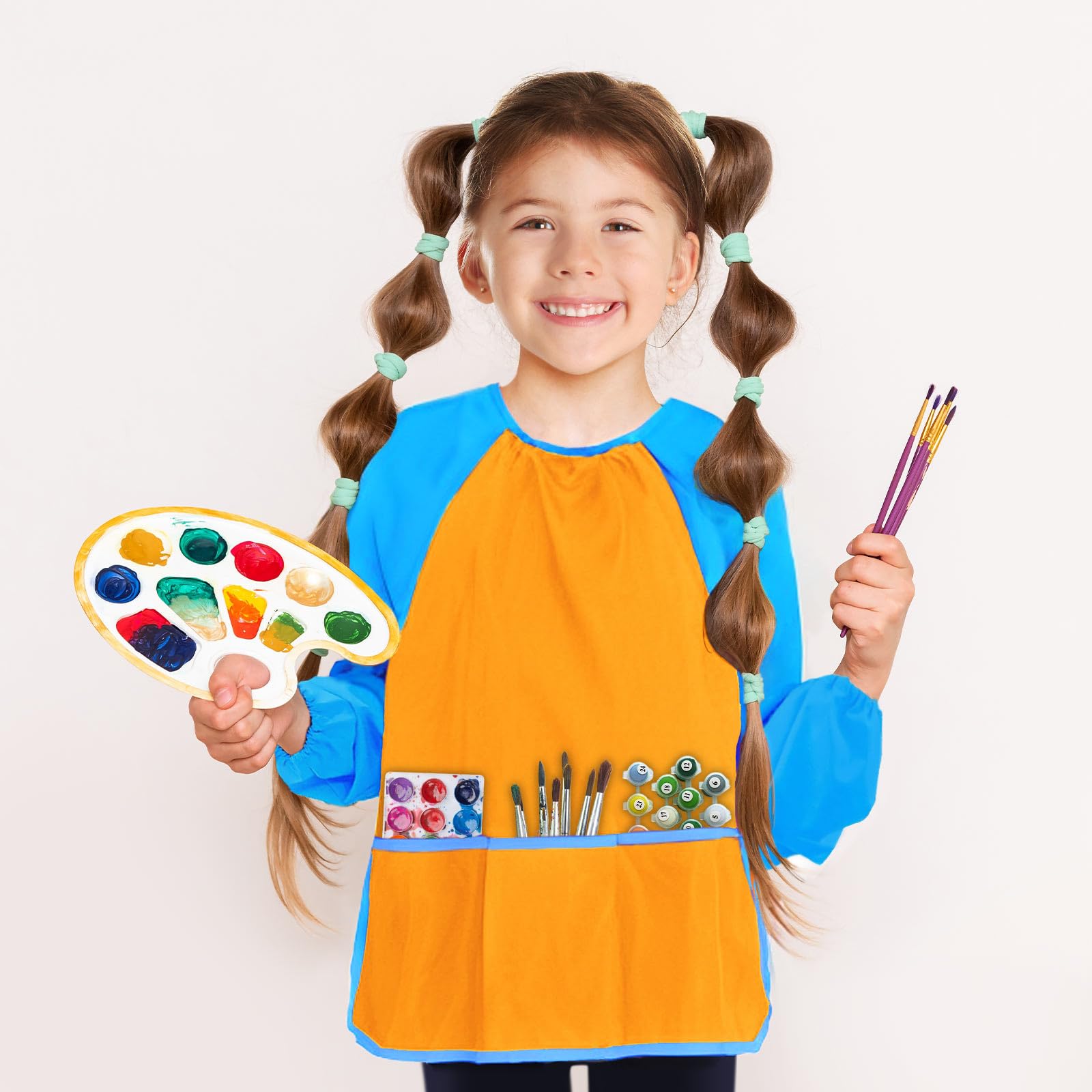 Kopokita Kids Art Smock in use during art to keep mess contained