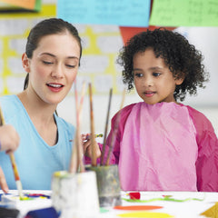Kopokita pink smock laid flat highlights lightweight, durable waterproof fabric.