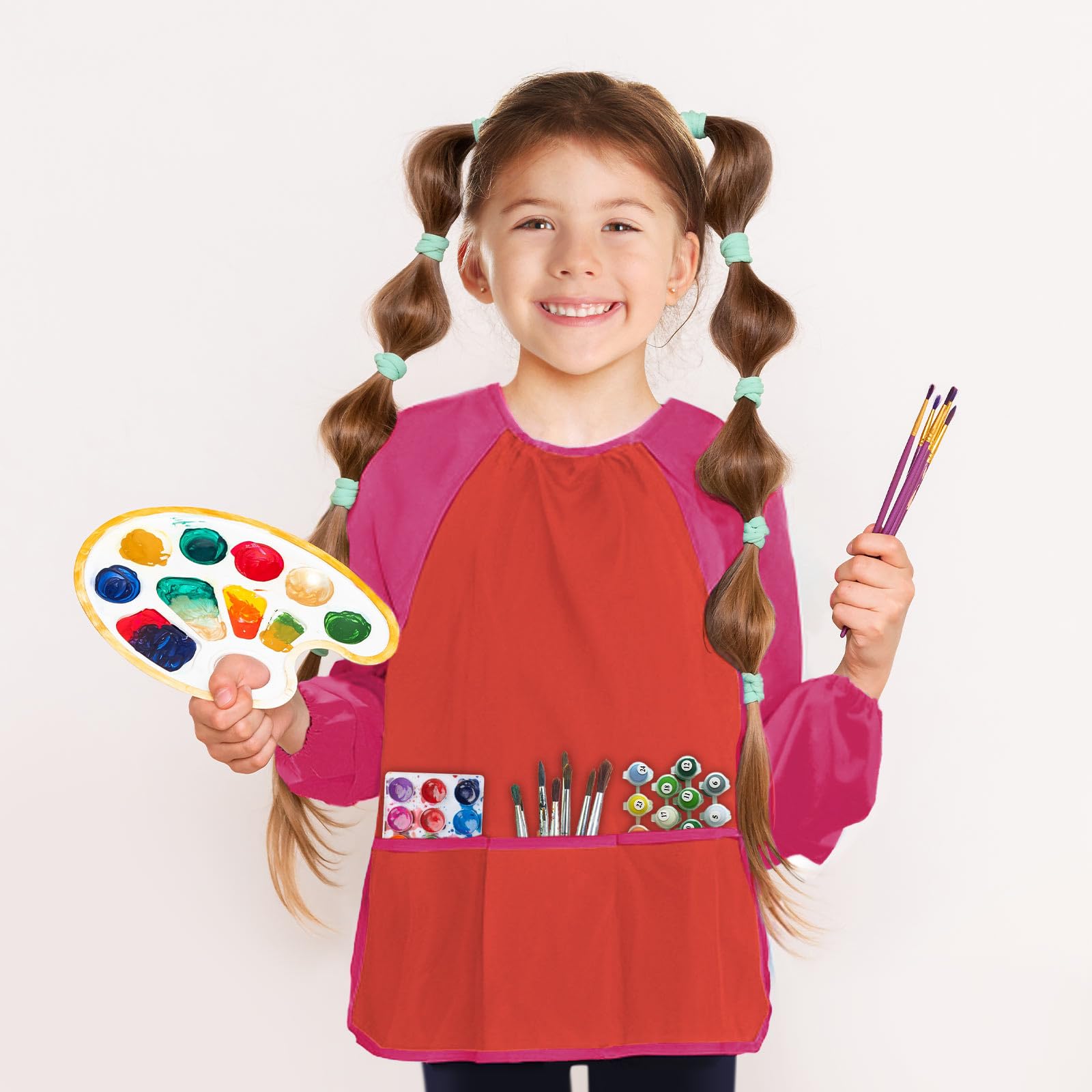 Kopokita Kids Art Smock uses waterproof material to contain messes.