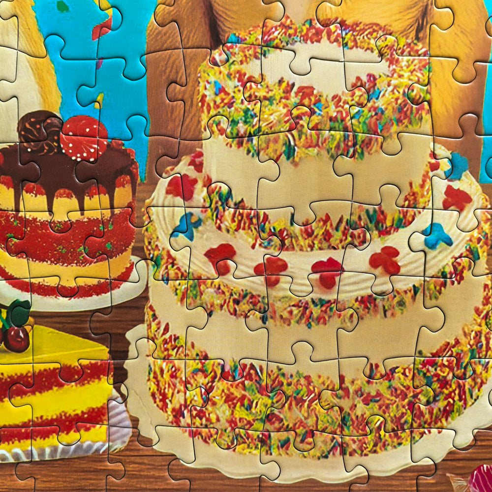 Kribin balloons and cake detail with vibrant hues for celebrations