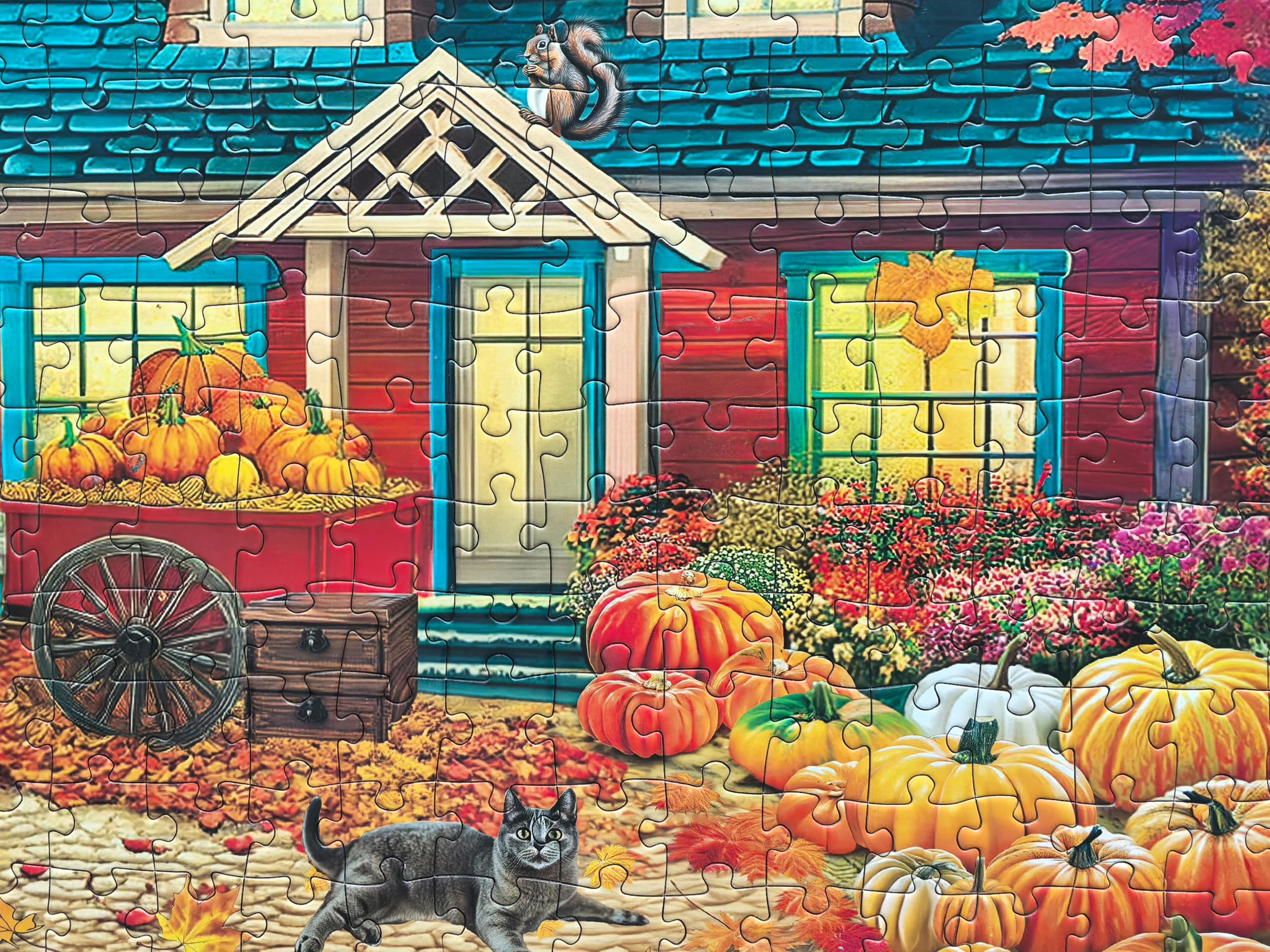 Kribin red-walled house with pumpkins puzzle offers charming fall vibes for home decor