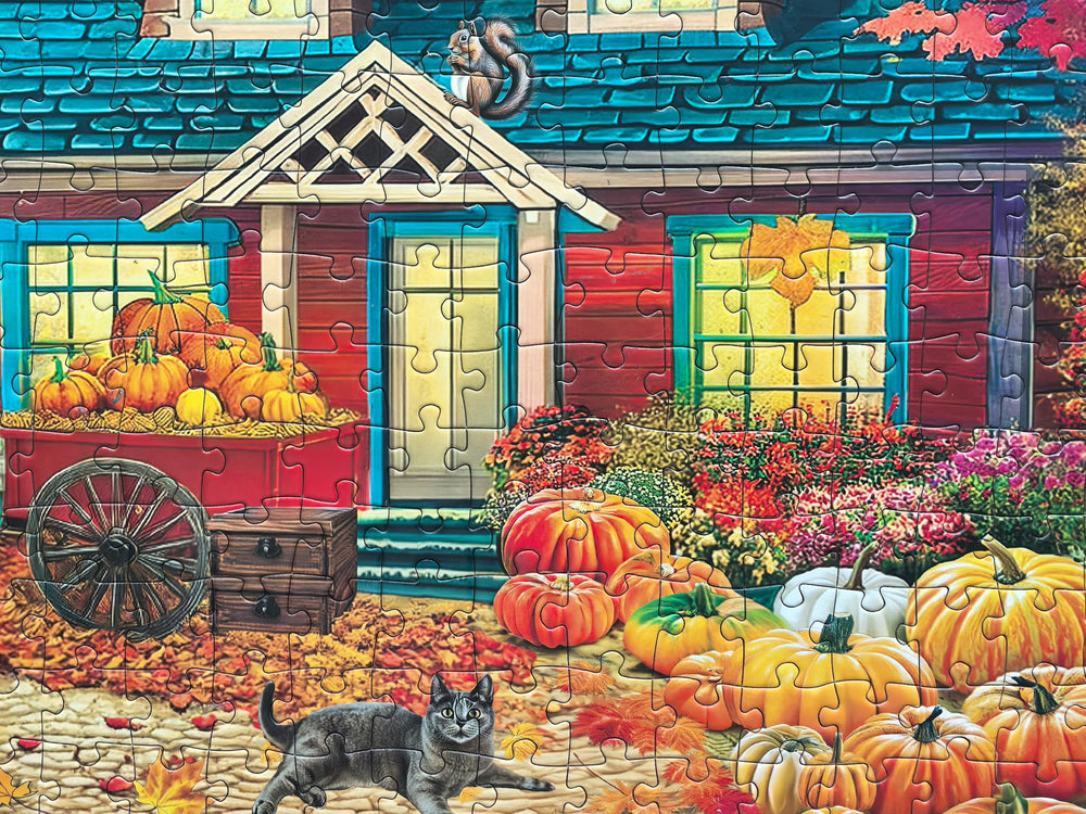 Kribin red-walled house with pumpkins puzzle offers charming fall vibes for home decor
