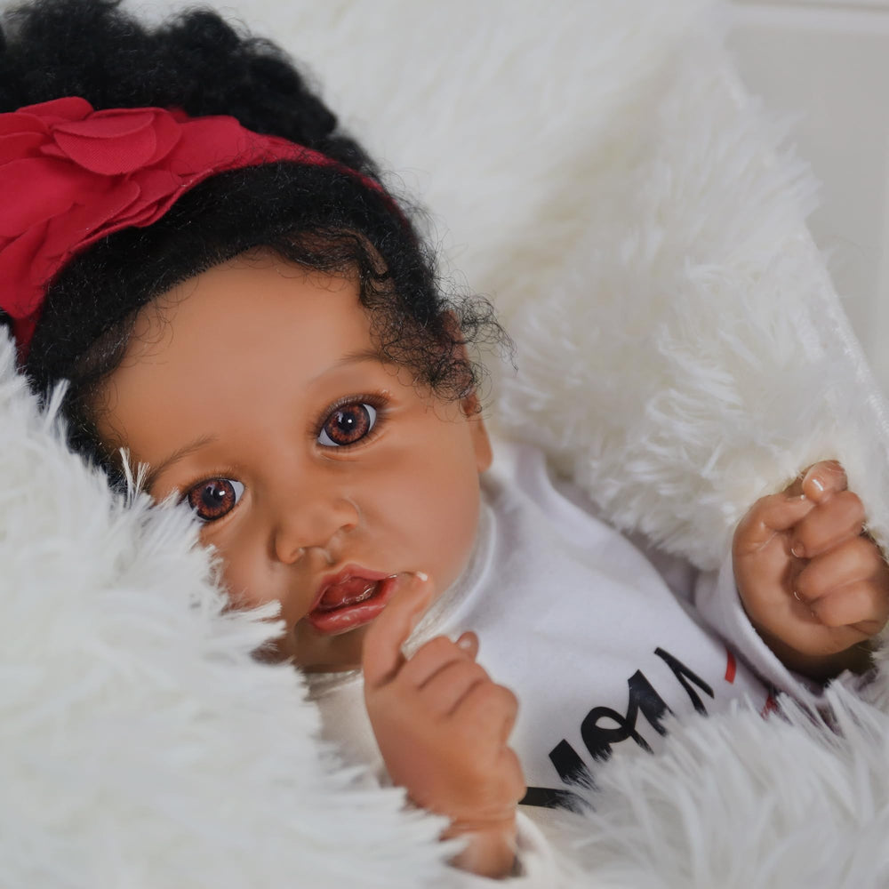 KSBD 20-inch lifelike doll with movable vinyl limbs in poseable positions