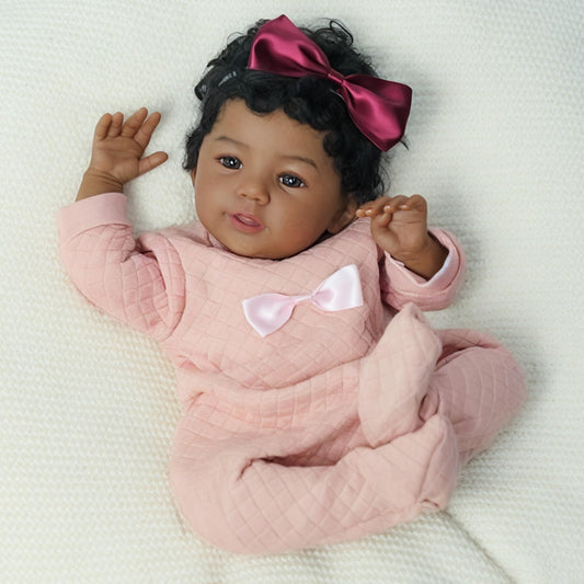 KSBD 18-inch Black girl reborn doll in romper for cozy pretend play.