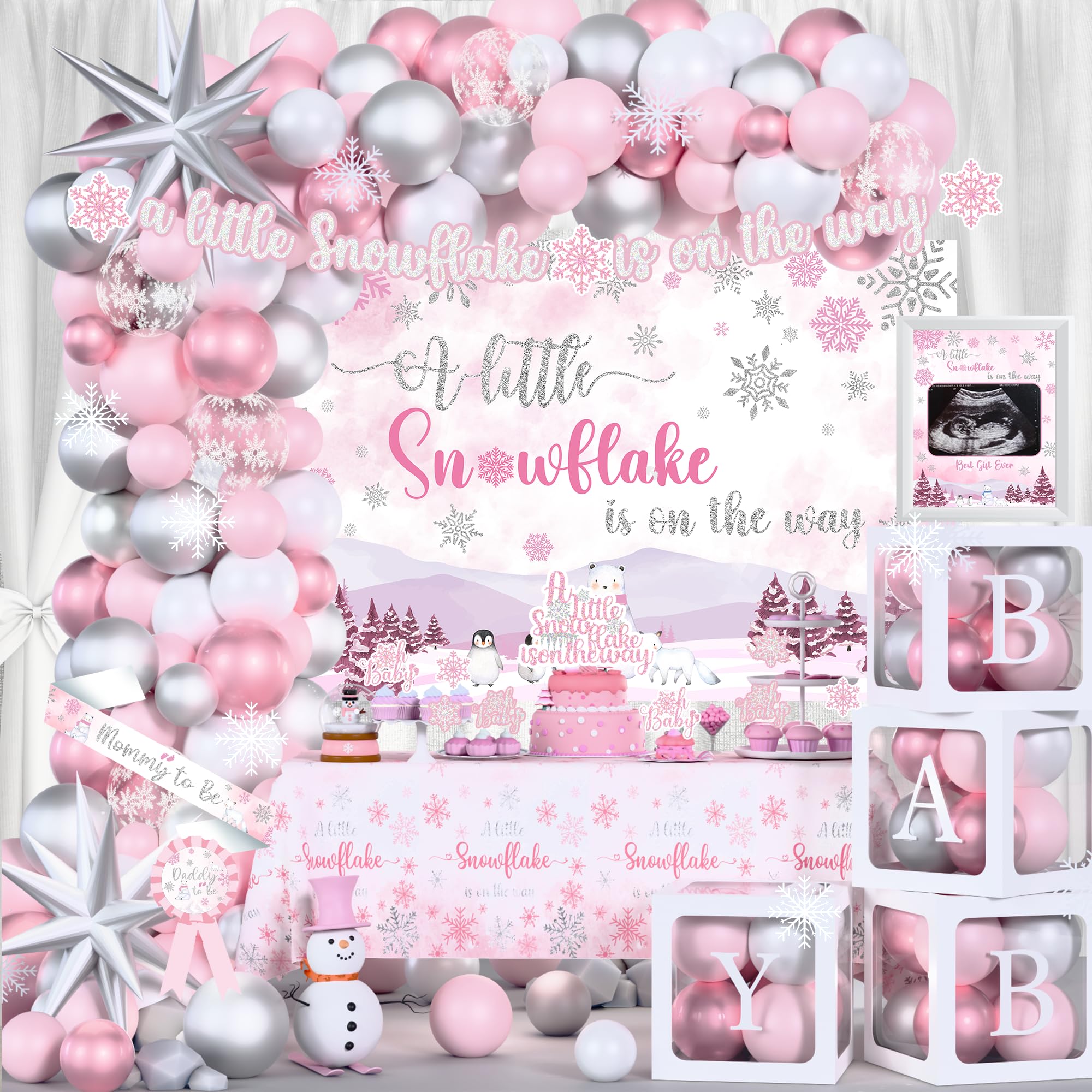 Kudapity winter little snowflake backdrop creates a charming baby shower setting