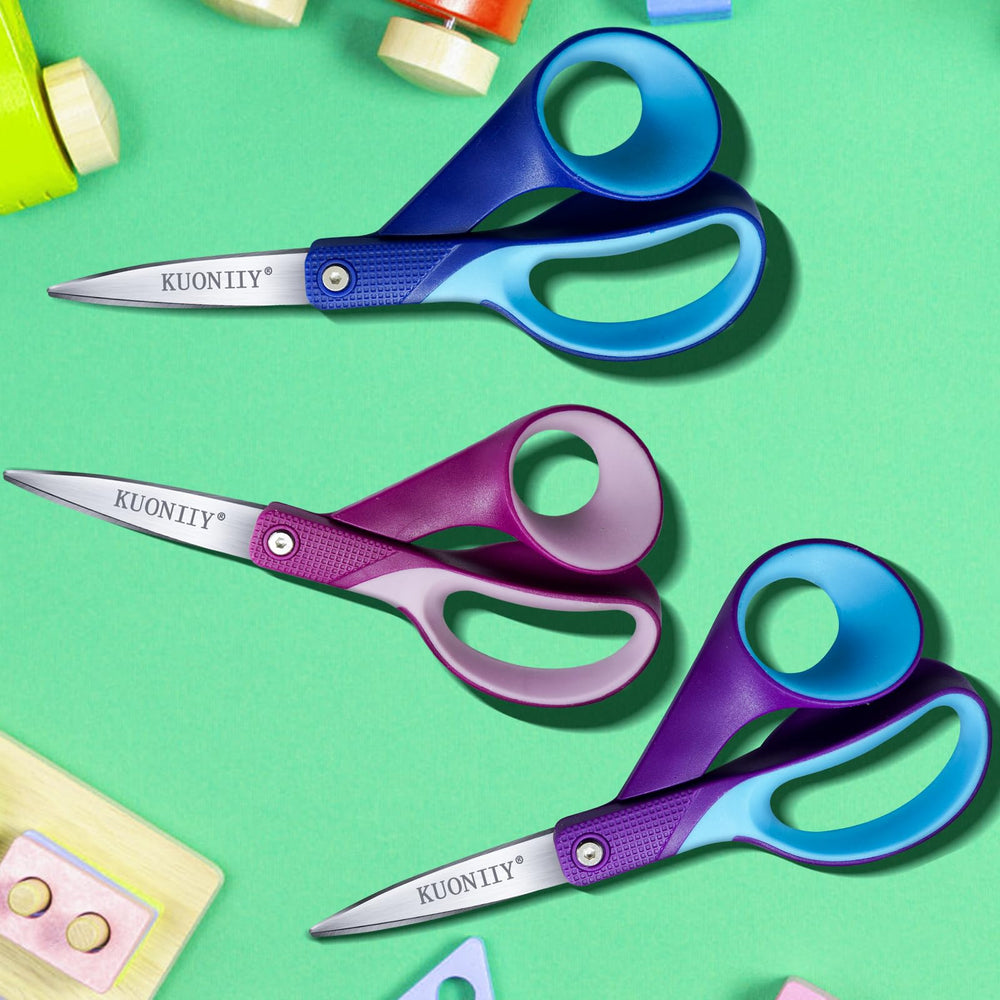 KUONIIY left-handed scissors 3-pack display for school or craft kits.