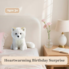 KUUDESOXX Arctic Fox plush being hugged for comforting companionship.