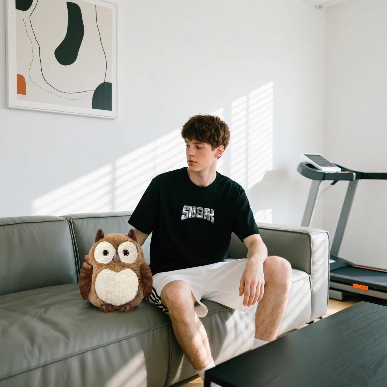 KUUDESOXX Owl plush toy displayed on shelf adds warmth
