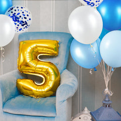 KUULBELA baby blue balloons pair with ribbons for gender reveal parties and baby showers.
