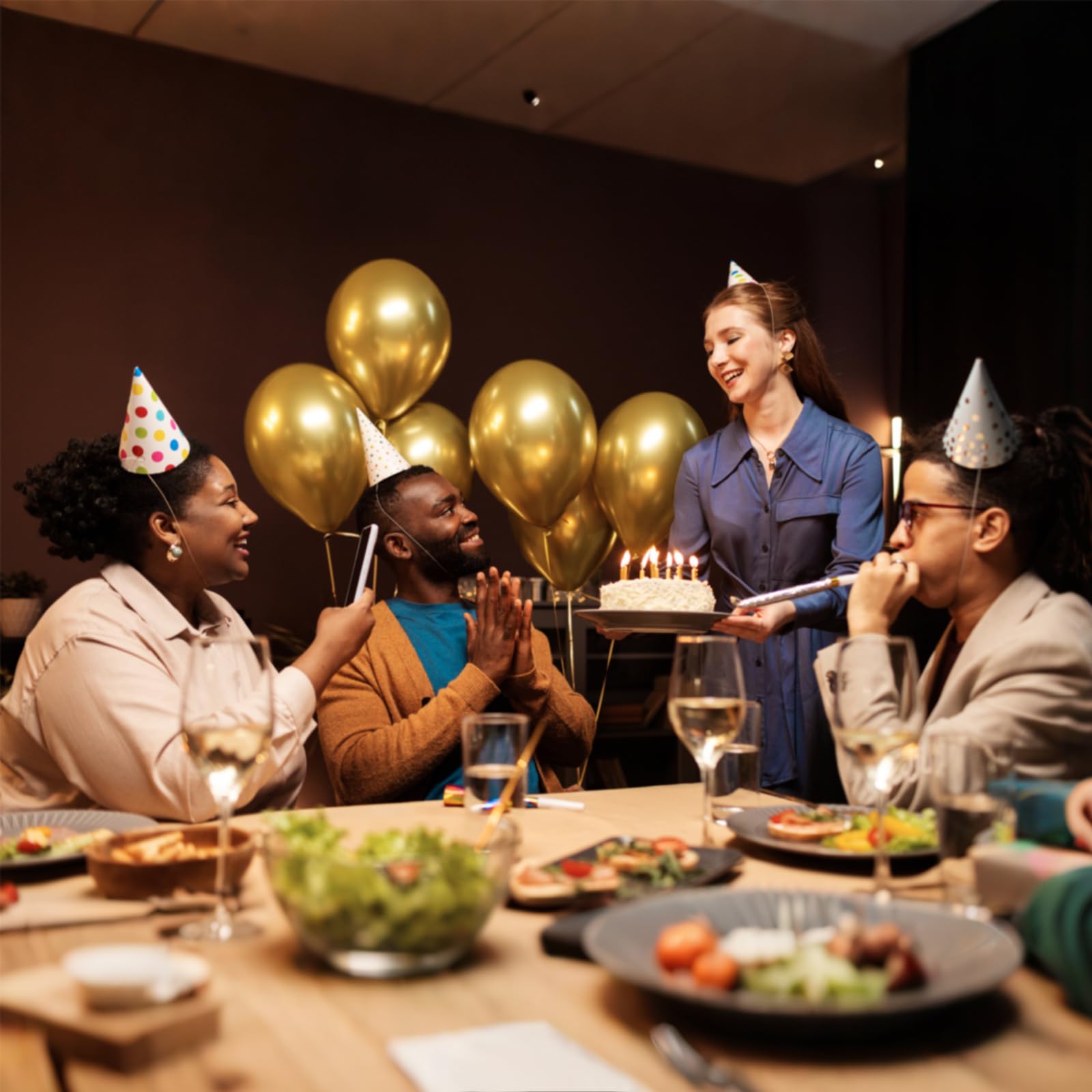 KUULBELA holiday party accents with metallic gold balloons.