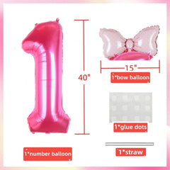 Kwuz pink birthday balloon display creates a festive centerpiece