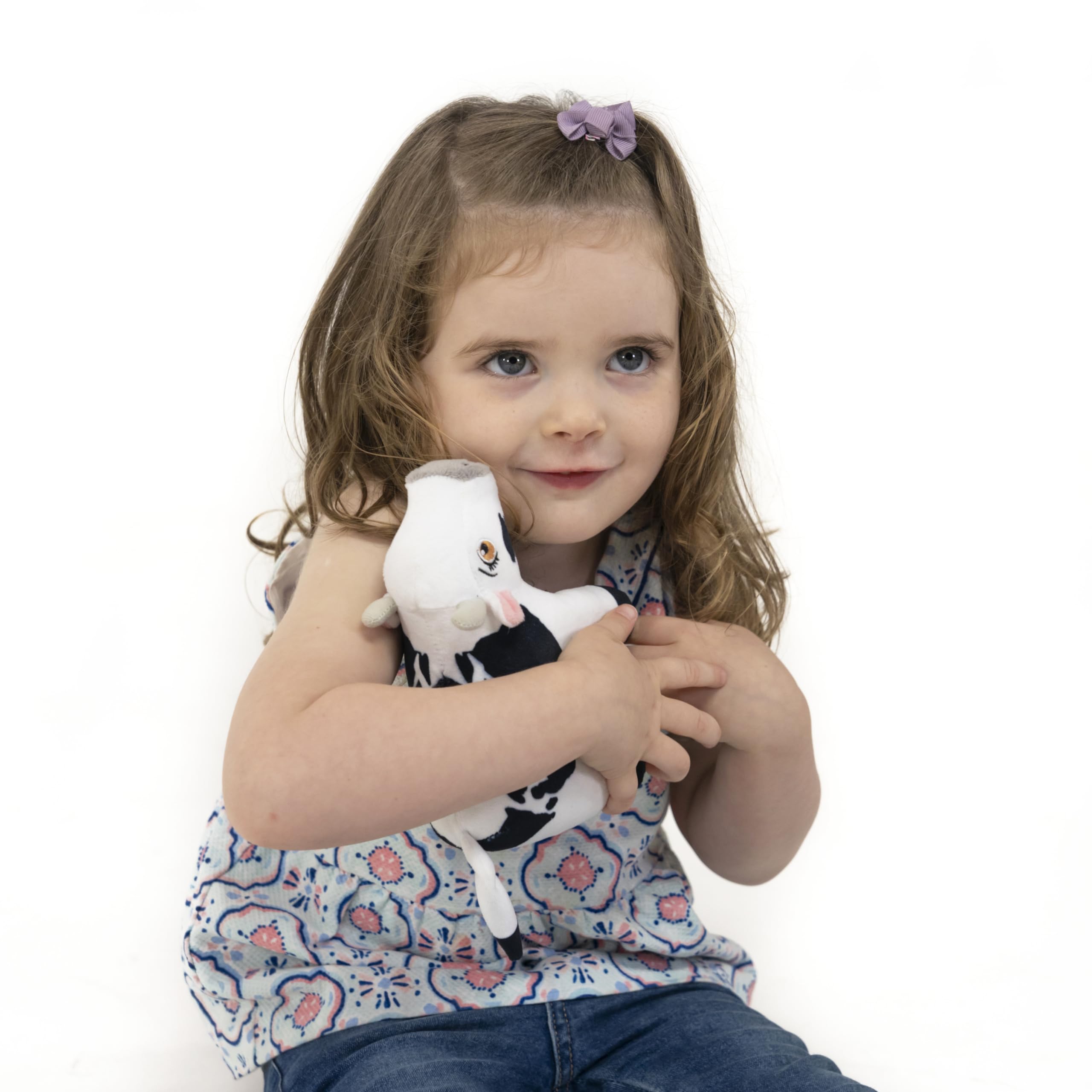 Compact 5-inch LA GRANJA DE ZENÓN Vaca Lola toy fits backpacks.