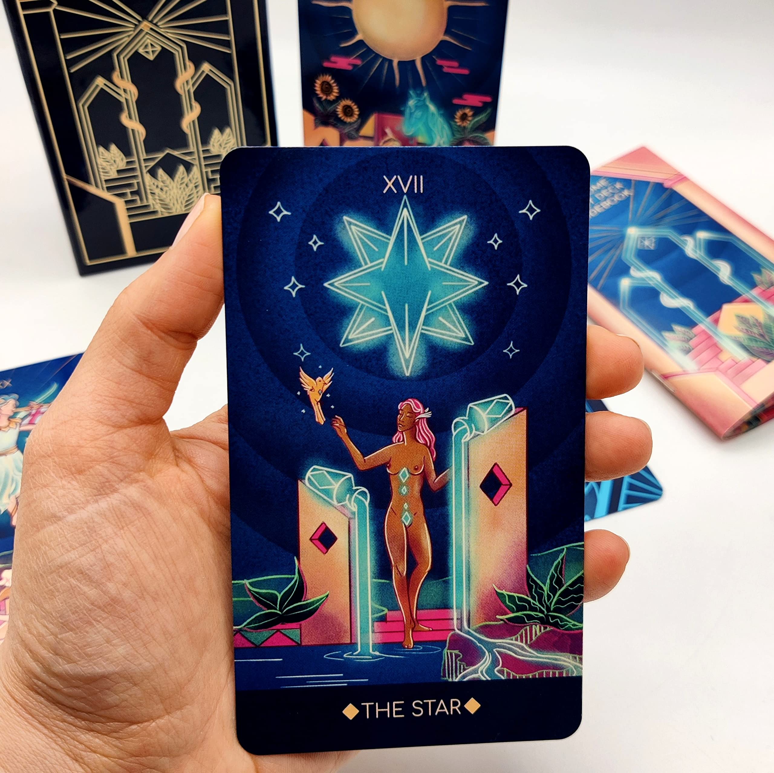 La Muci Fantome geometric art on each card enhances visual appeal.