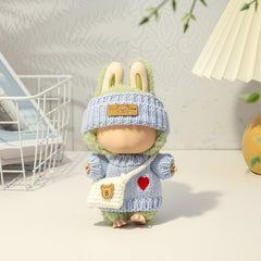 LABUBU crochet hat in blue to complete the doll outfit.