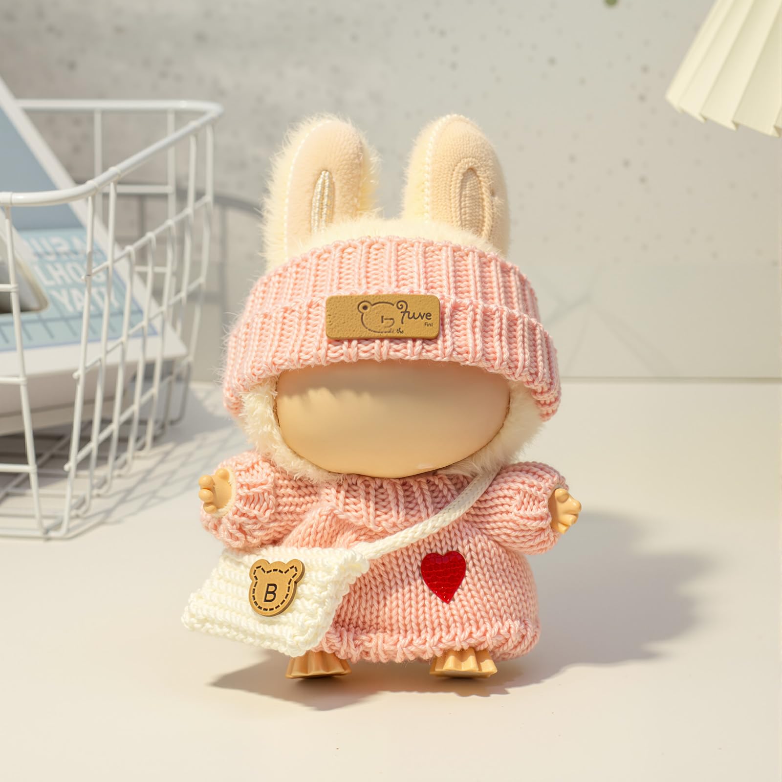 Close-up of heart stitch detailing on Labubu 17cm doll sweater.