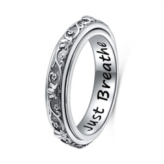 Ladytree spinner ring with lotus flower, offering subtle stress relief on the go.