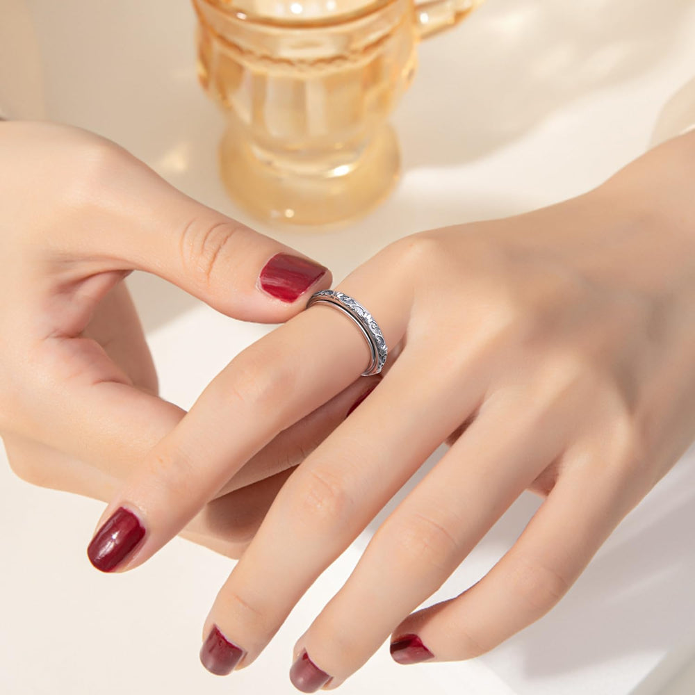 Ladytree yoga-inspired ring promotes mindful breathing during anxious moments.