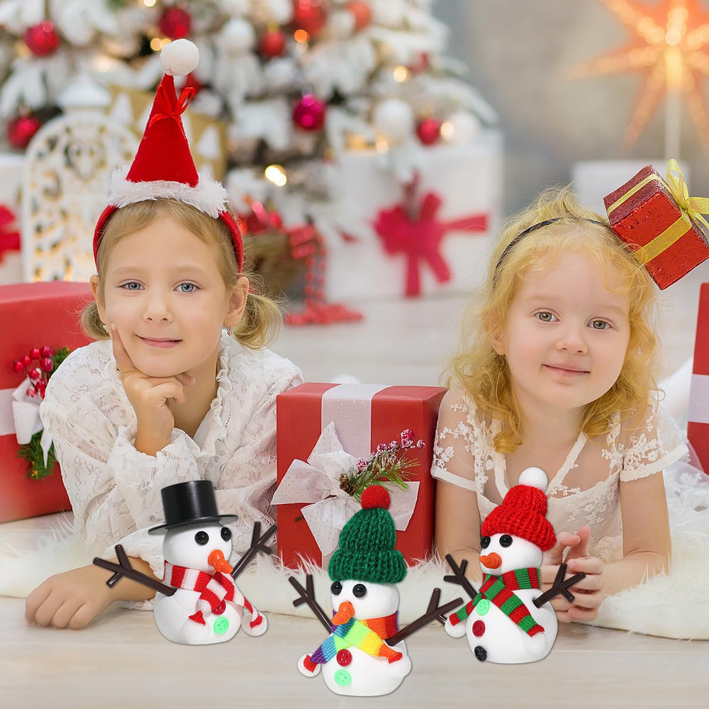 LAHAND hats and scarves add personality to each frosty figure.