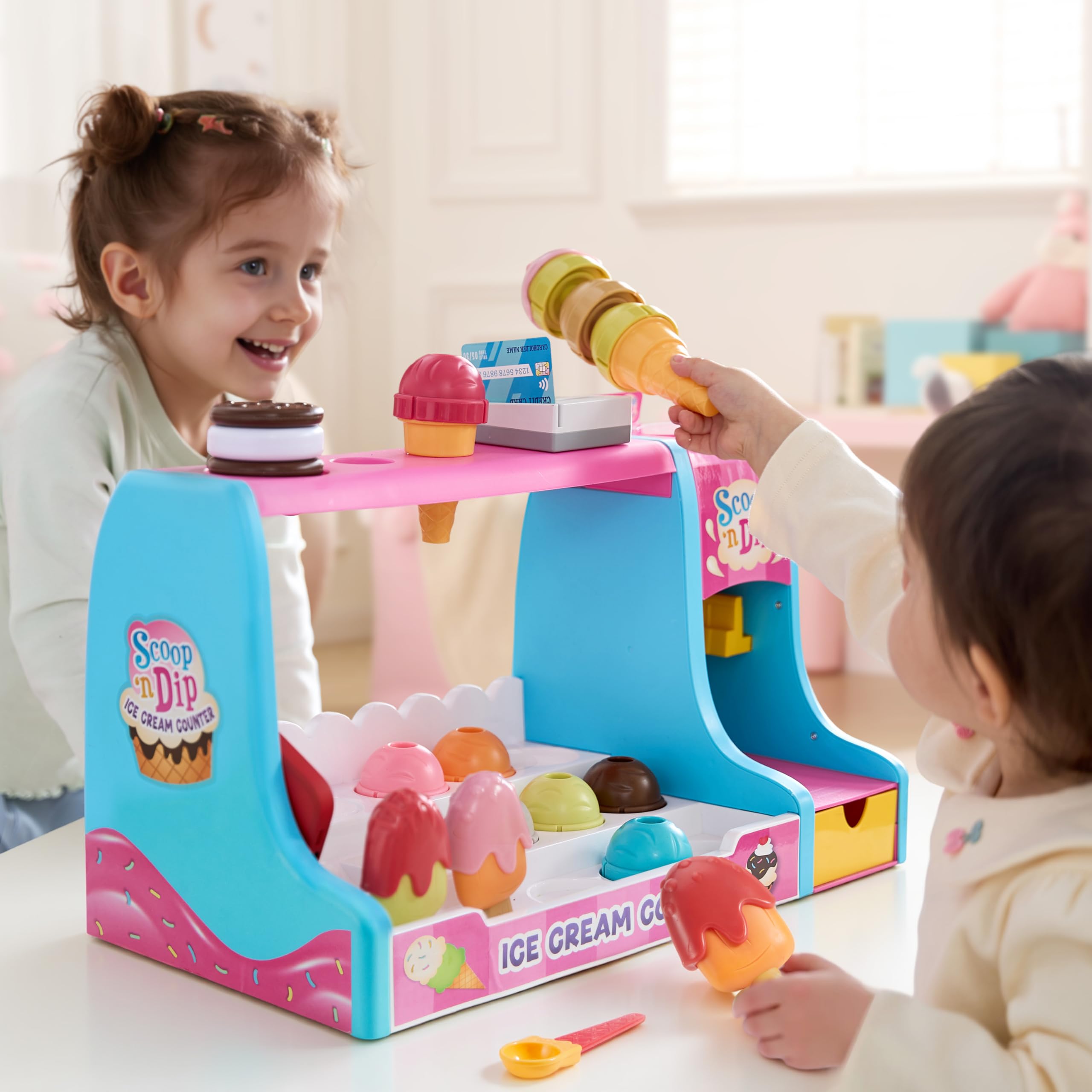 Lalalark rich accessories invite varied play, from ordering to serving in a pretend shop.