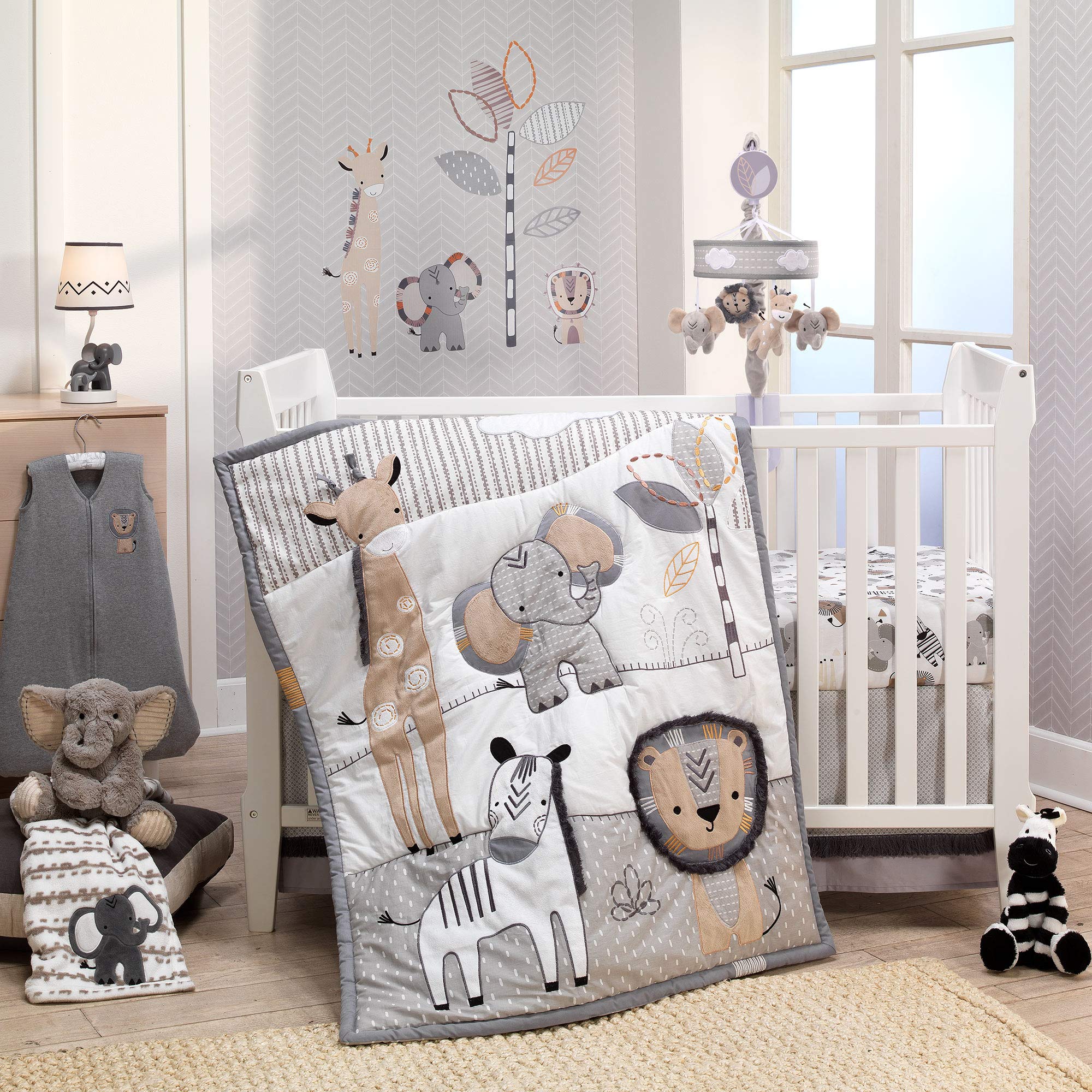 Lambs & Ivy Jett gray plush elephant in a sitting pose for snug naps.