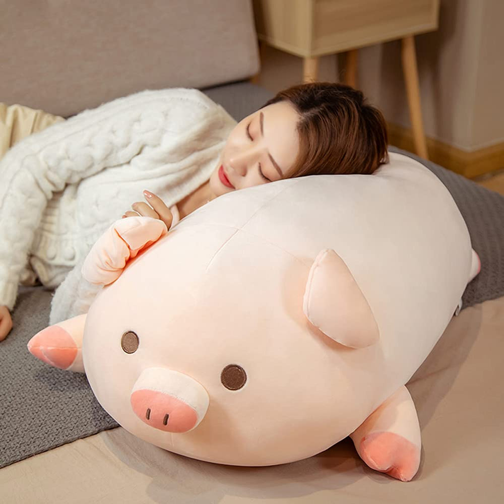 Lannery pig hug pillow with squinted eyes, ideal for comforting naps.