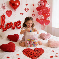 LAOREI red heart latex balloons create bold color focal points.