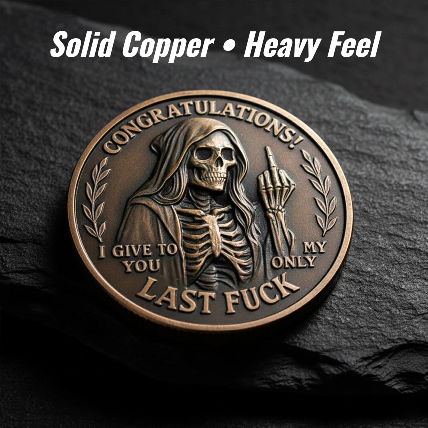 Last Fuck to Give coin side A with engraved motto and skull.