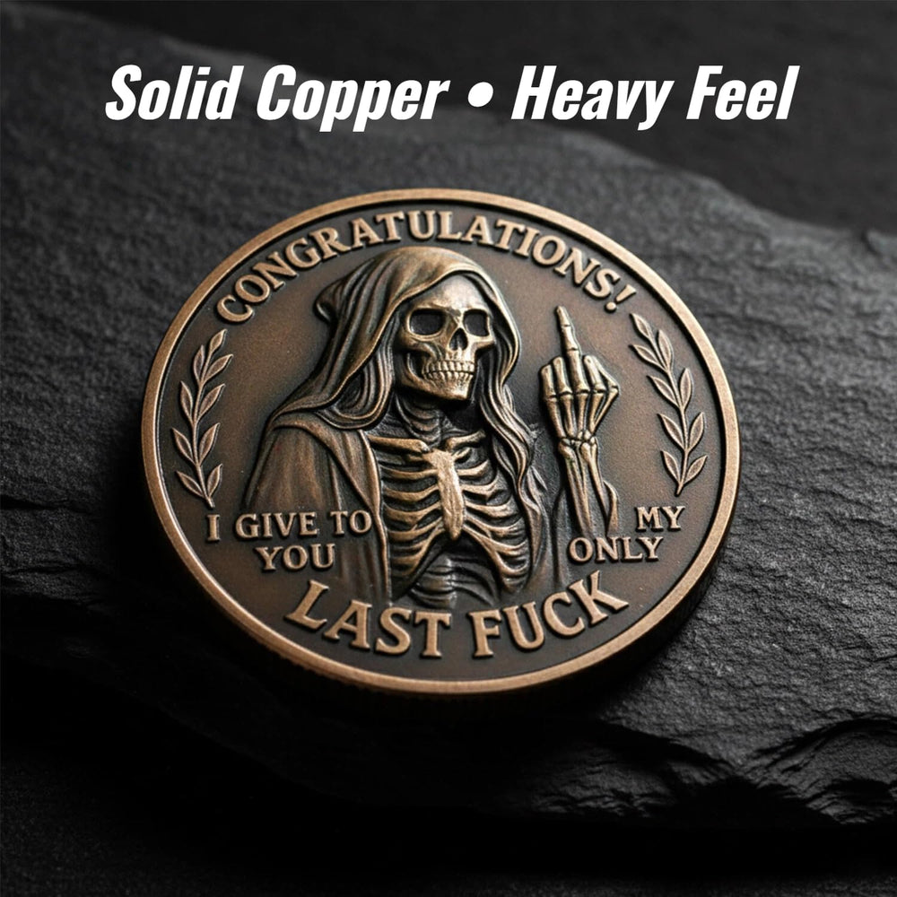 Last Fuck to Give coin side A with engraved motto and skull.