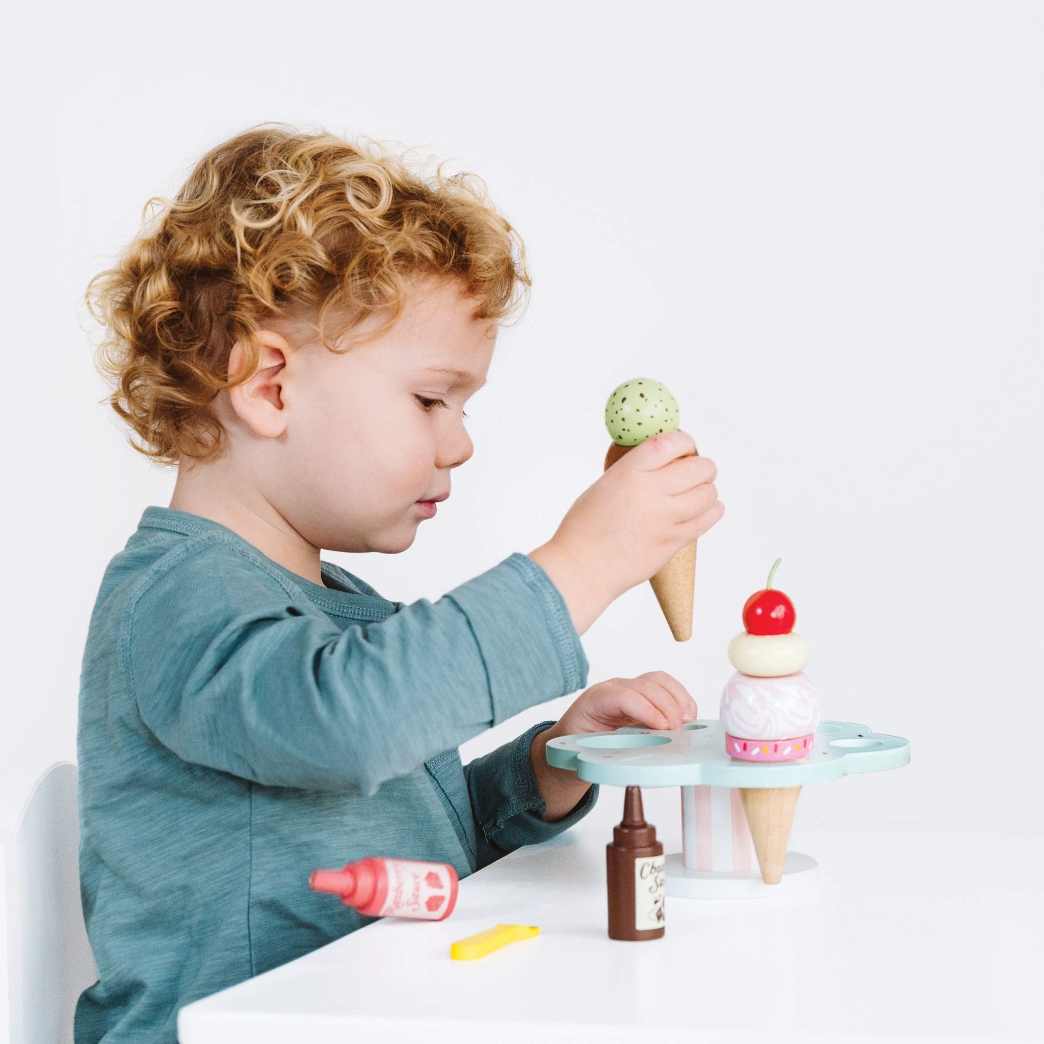 Bright non-toxic paint details adorn Carlo's Gelato for a cheerful look.