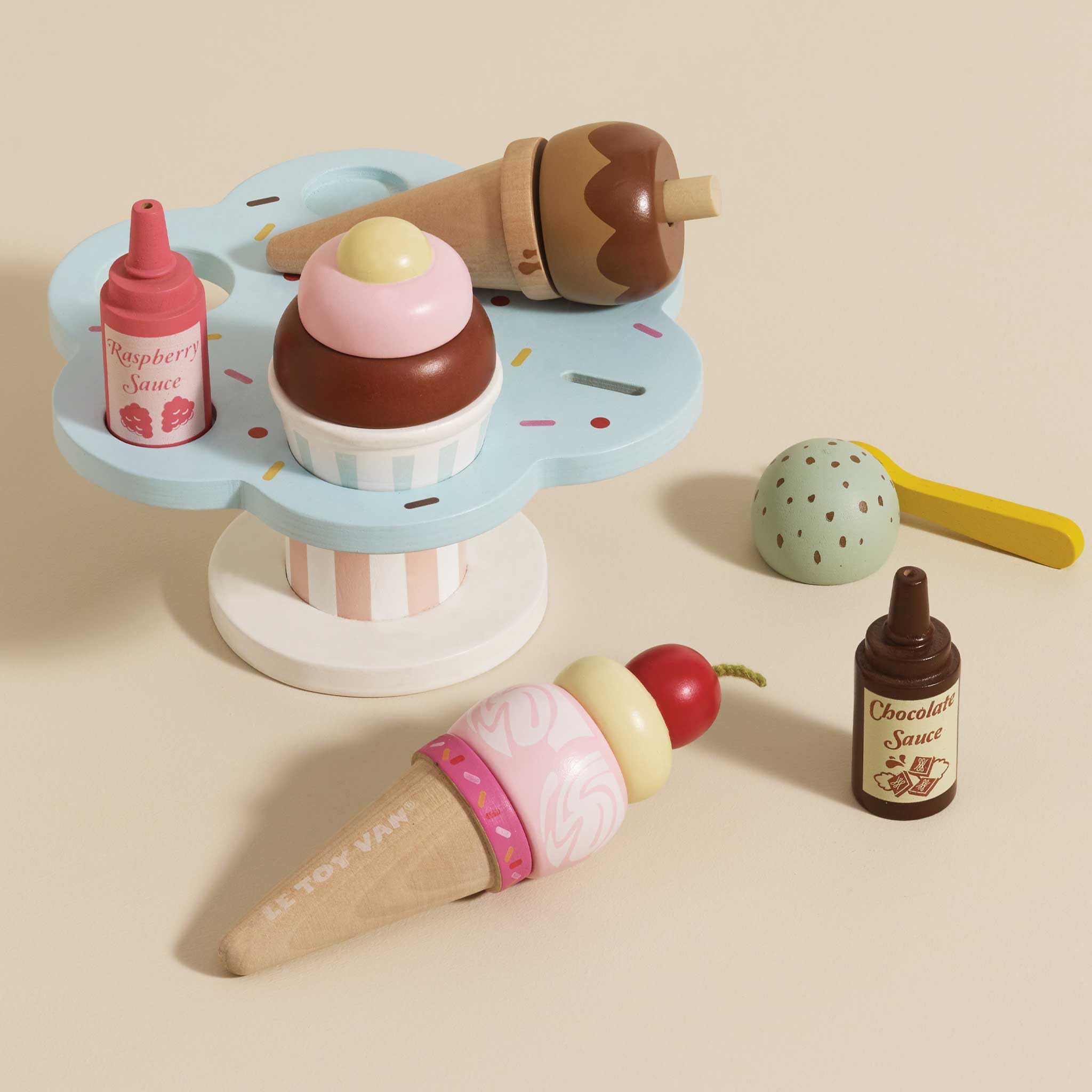 Three wooden spoons included for shared pretend dining with Carlo's Gelato.