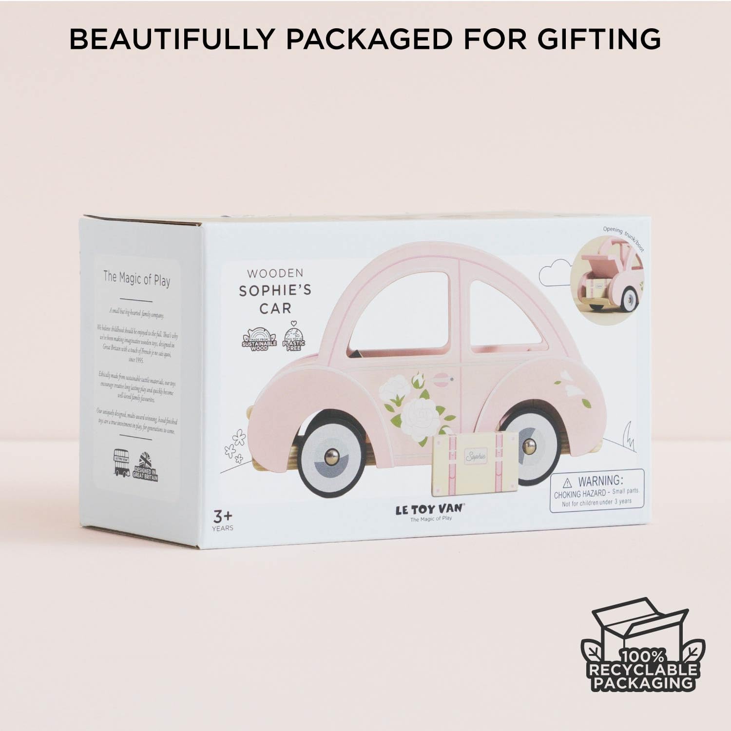 Pink Sophie's car with luggage enhances coordinated play across rooms.